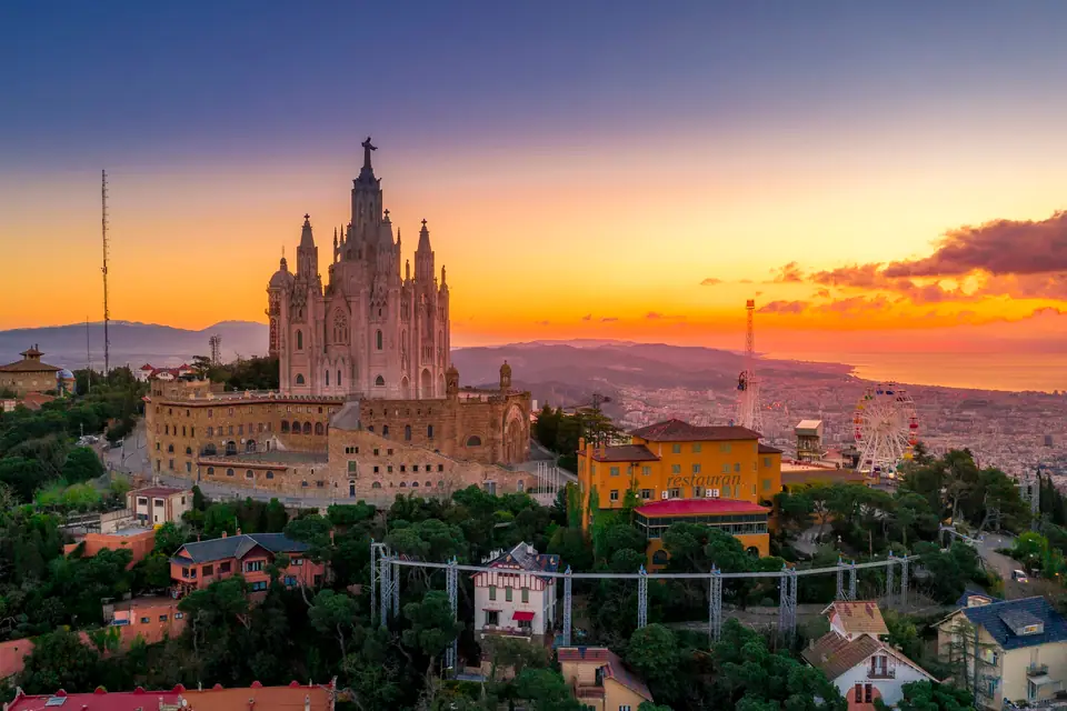 Tibidabo church on the hill above Barcelona at sunset