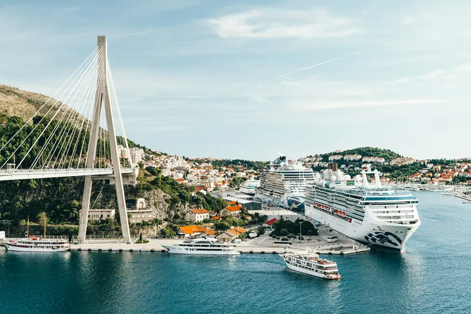 Franjo Tuđman Bridge above Gruž port in Dubrovnik with a cruise ship