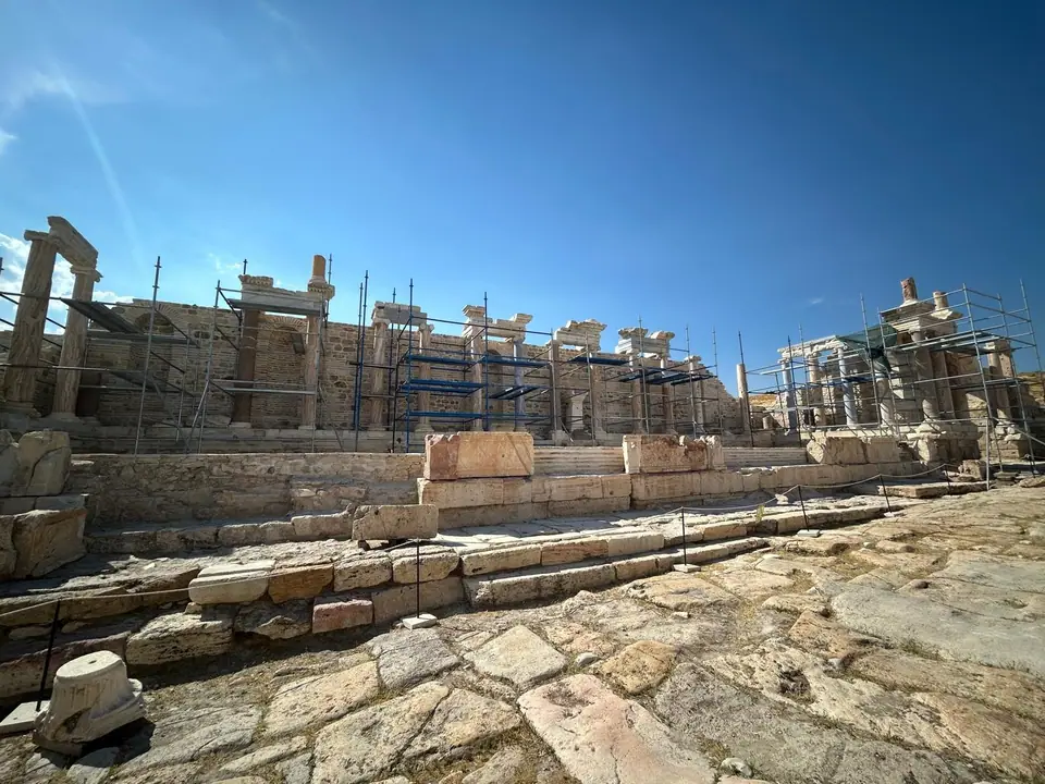 Monumental building front at Tripolis covered in scaffolding during restoration