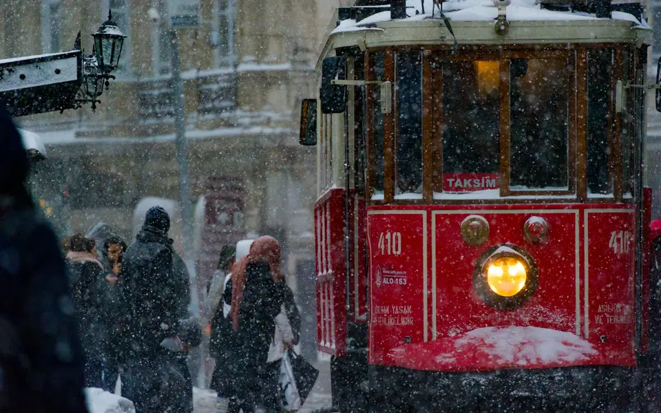 Red nostalgic tram on Istiklal Avenue