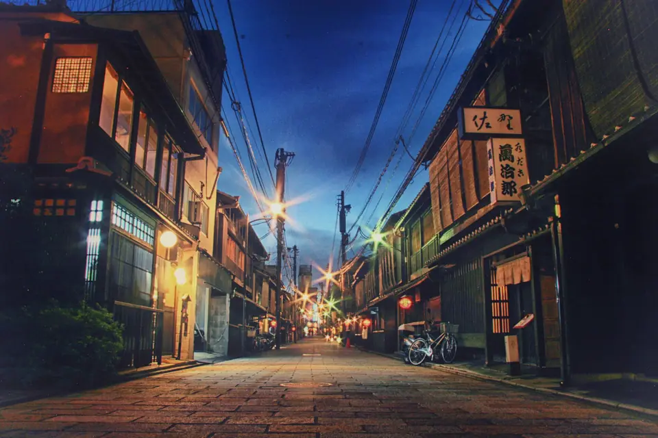 Wooden townhouses in Gion at dusk