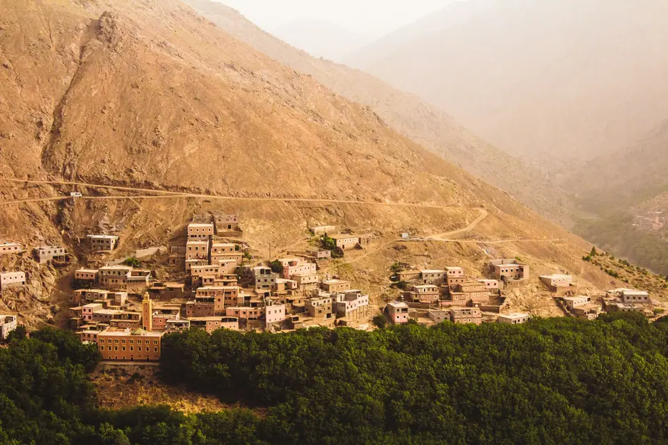 Earth-coloured Amazigh village on a slope in the High Atlas