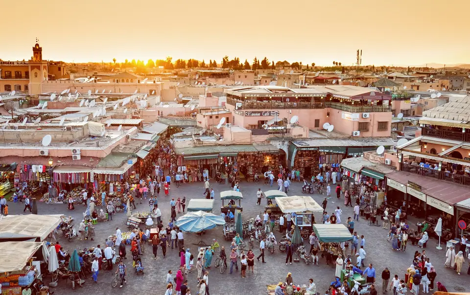Crowds and stalls on Jemaa el-Fna square in Marrakech