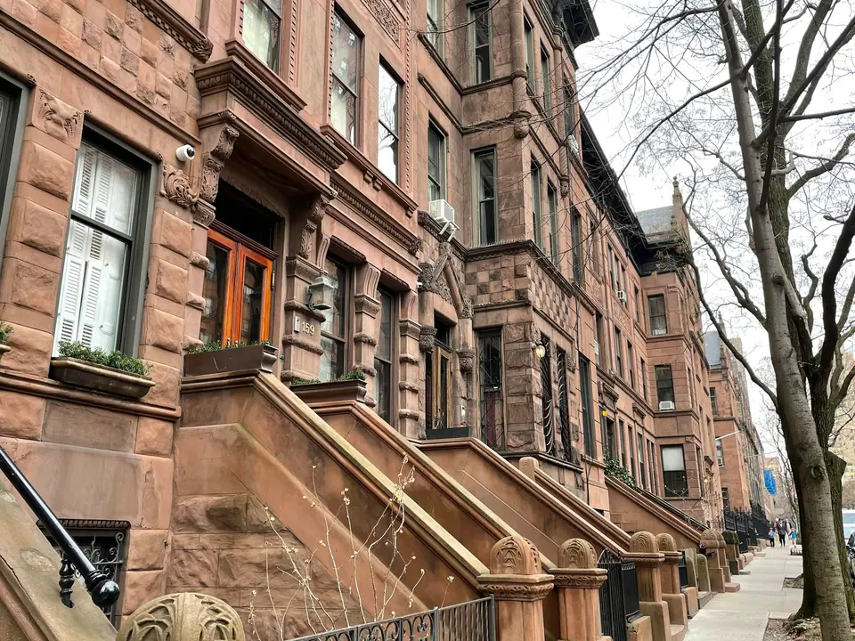 Row of brownstone houses with stoops in New York