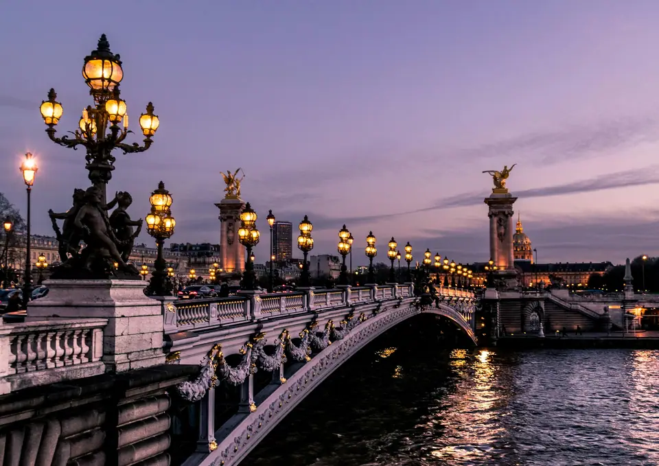 Pont Alexandre III and its lamps over the Seine at dusk