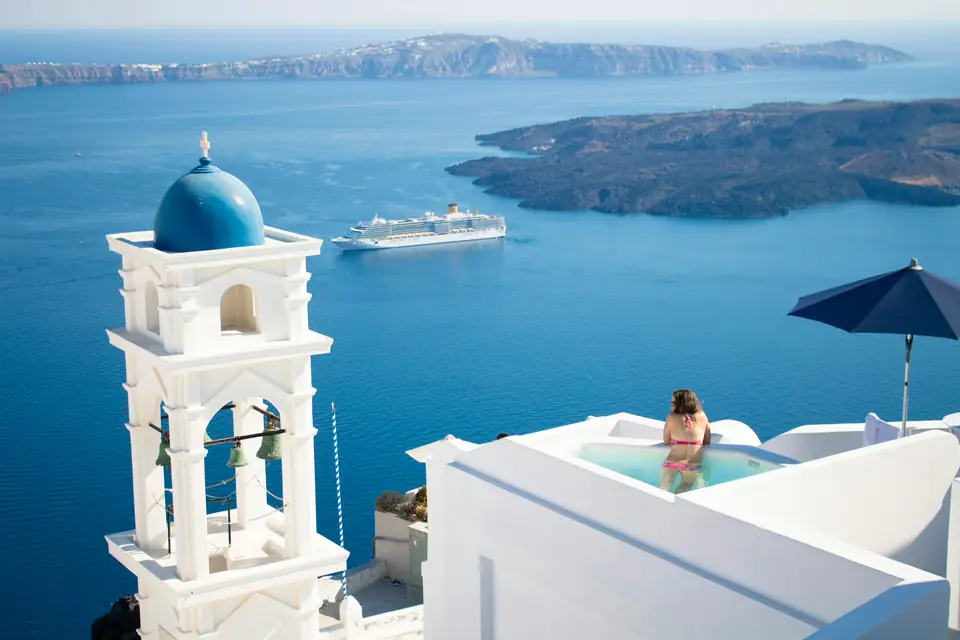 Bell tower above the Aegean in Santorini
