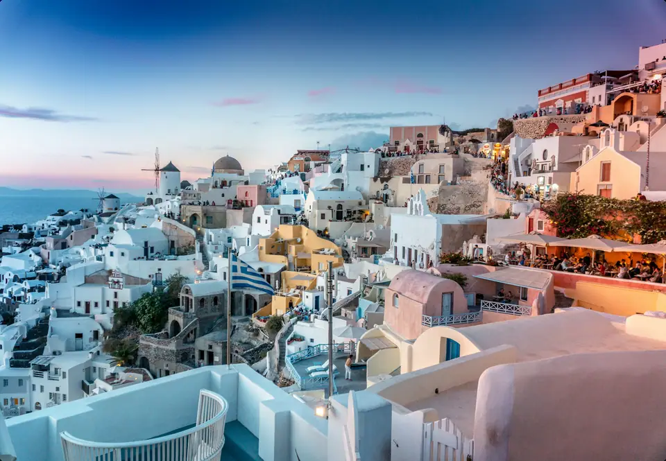 White houses of Oia on the caldera cliff