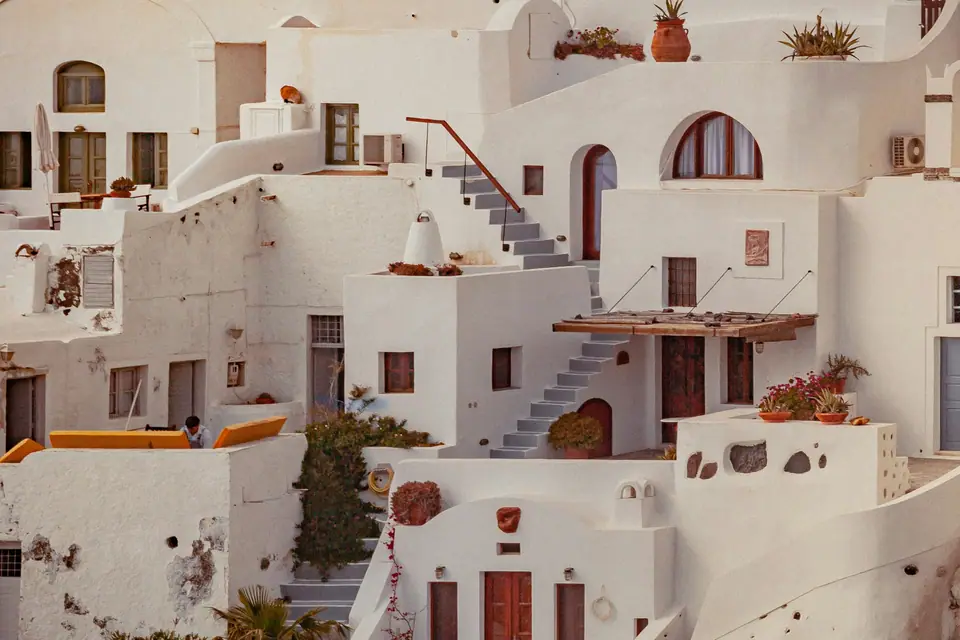 Stepped white lanes of a Santorini village