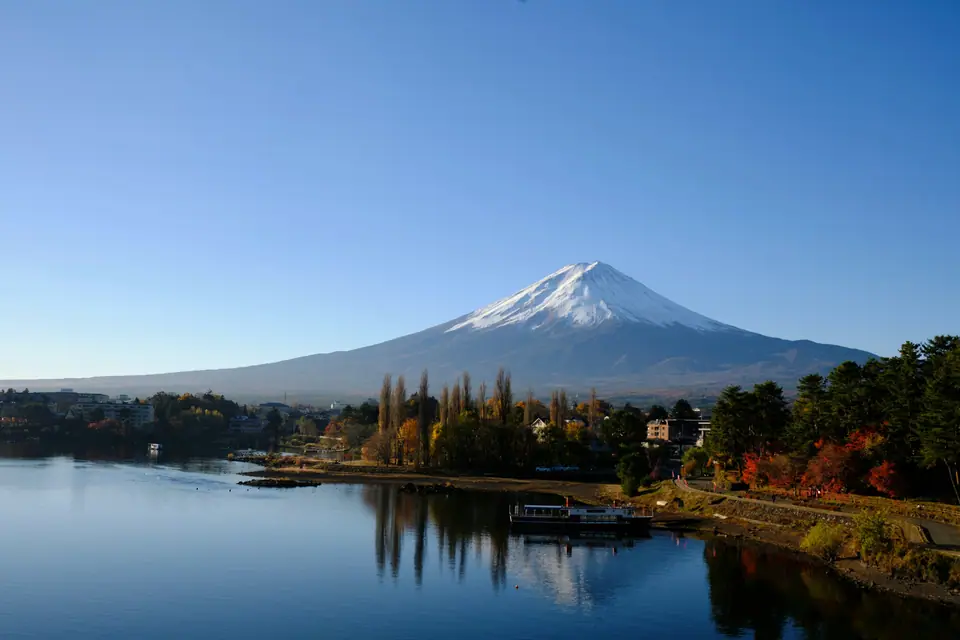 Mount Fuji rising behind Lake Kawaguchi in autumn